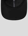 Top view of black New Era Haas cap with glitter silver brim and 9Seventy branding on crown tape