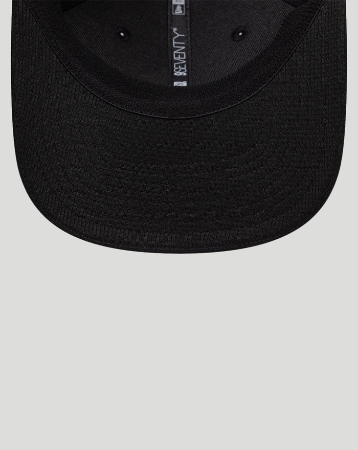 Top view of black New Era Haas cap with glitter silver brim and 9Seventy branding on crown tape