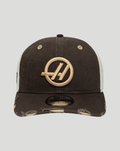 Dark brown Haas Team 9Seventy cap with a beige embroidered circular logo on the front and a distressed brim.