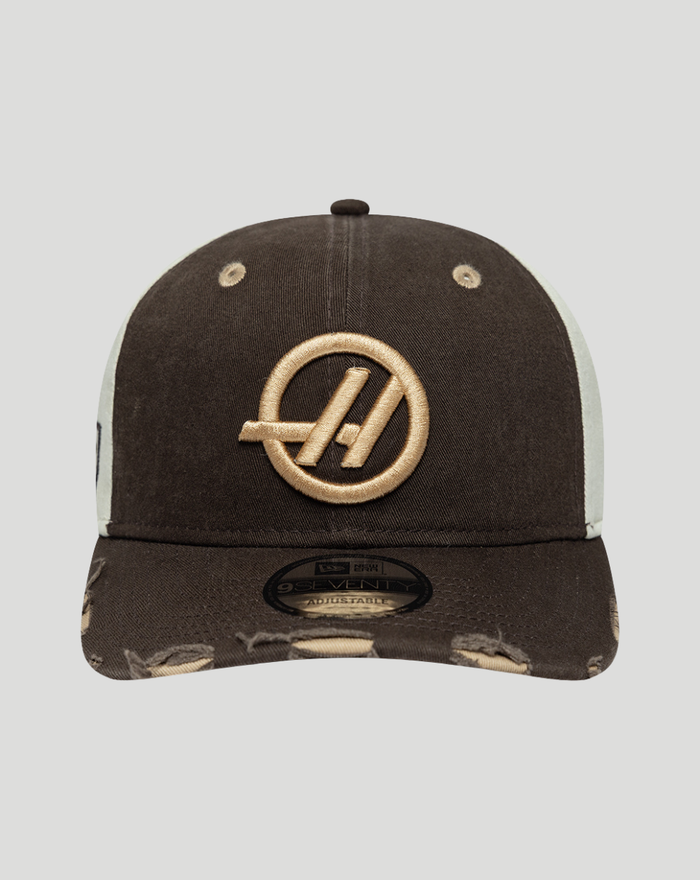 Dark brown Haas Team 9Seventy cap with a beige embroidered circular logo on the front and a distressed brim.