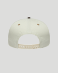 Back view of a cream Haas Team 9Seventy cap with a beige adjustable plastic strap.
