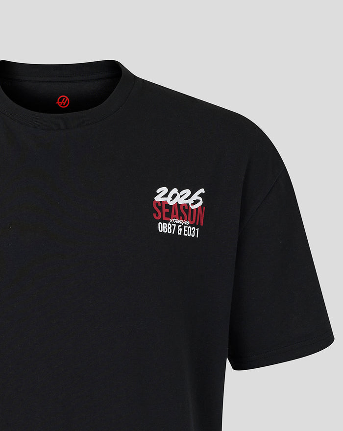 Close-up of black Haas World Tour T shirt left chest graphic featuring 2026 SEASON in white and red.