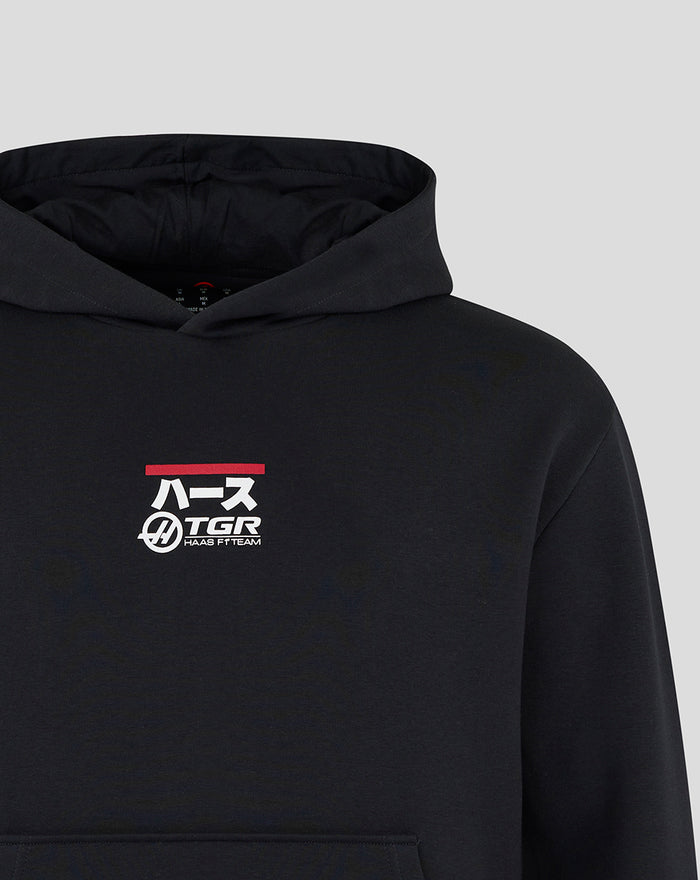 Black Haas Team hoodie featuring a racing car graphic and branding on the left chest and upper back.