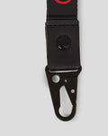 Close up of black Haas Team Lanyard showing leather tab and metal clip
