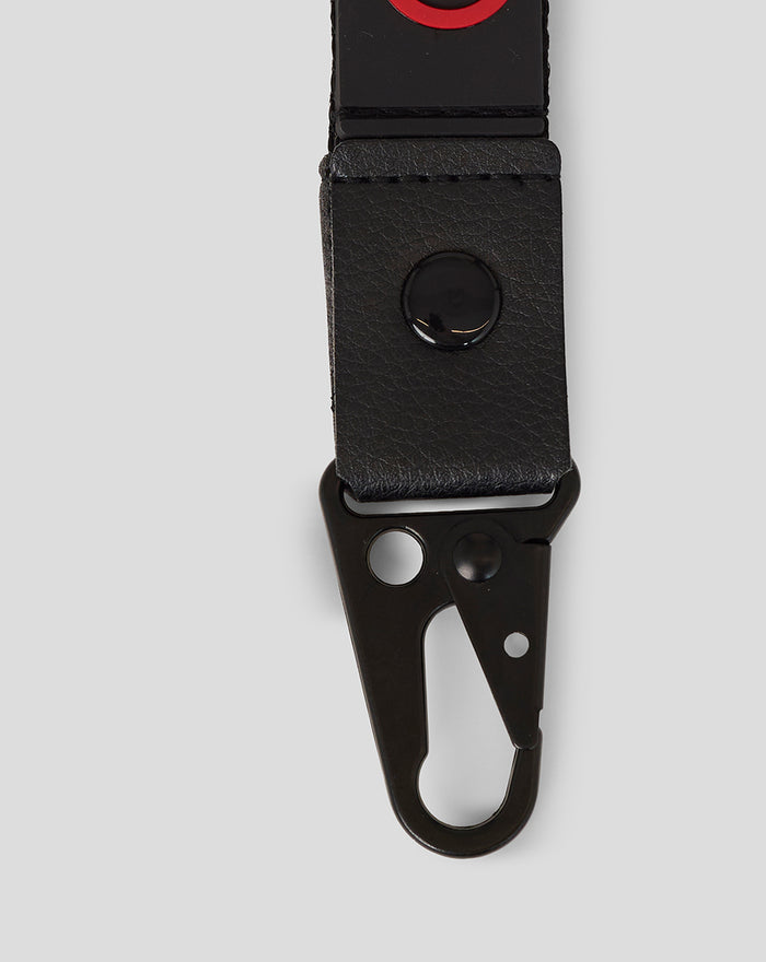 Close up of black Haas Team Lanyard showing leather tab and metal clip