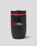 Black Haas F1 Team travel coffee cup with red accent ring and center logos
