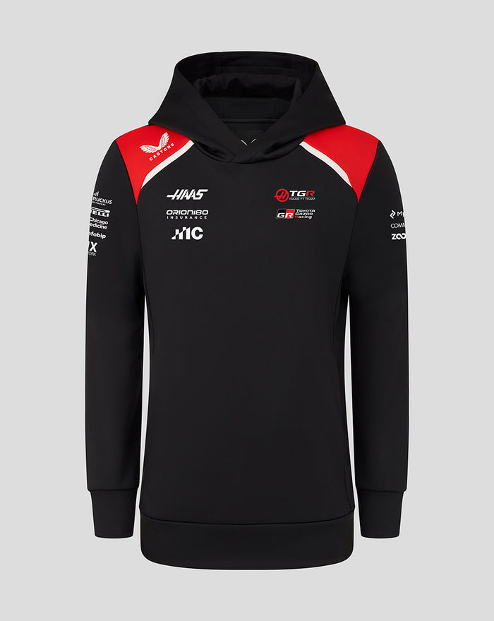 Model wearing Official Haas Team Junior Pullover Hoodie in black with red accents and branding
