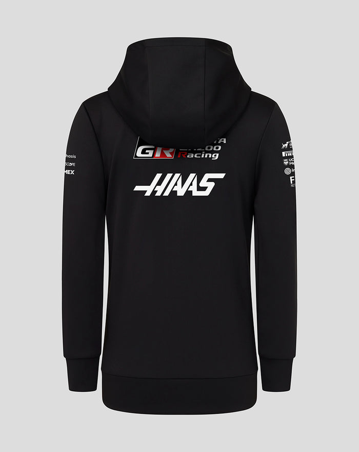 Back view of black Haas Team Junior Pullover Hoodie with large white Haas logo across the back