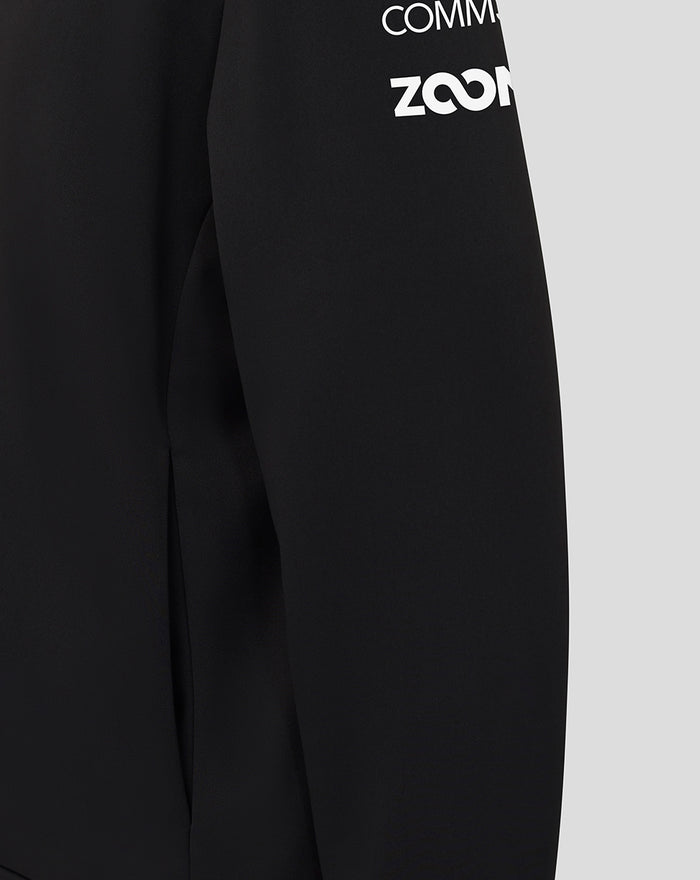 Close up of black Haas Team Junior Pullover Hoodie sleeve with white branding.