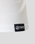Haas F1 Team woven label at the lower front hem of a white T-shirt