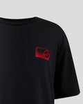 Black T shirt with a small red left chest logo and woven sponsor label at the front hem.