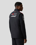 Back view of black Haas Team Unisex Gilet with logos on the back