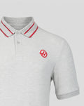 Grey Haas polo with left chest logo and upper back branding, red striped rib collar and right arm sponsor label