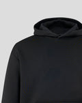 Close up of black hoodie fabric at the shoulder and hood seam highlighting soft fleece material