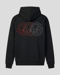 Back view of a black Haas hoodie featuring a large red and white monogram graphic across the upper back