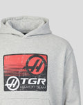 Close up of upper chest on grey hoodie featuring distressed TGR Haas F1 Team logo.